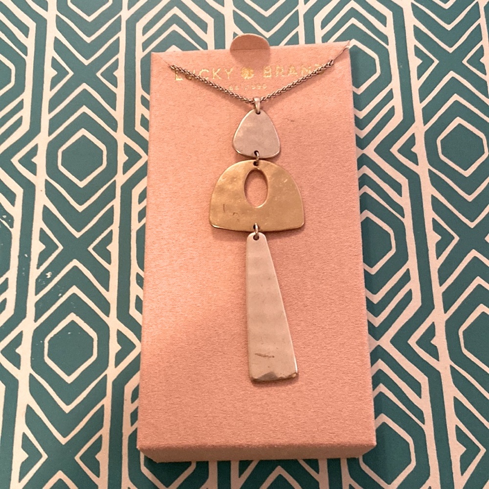 Silver and gold Lucky Brand necklace, chain is silver.